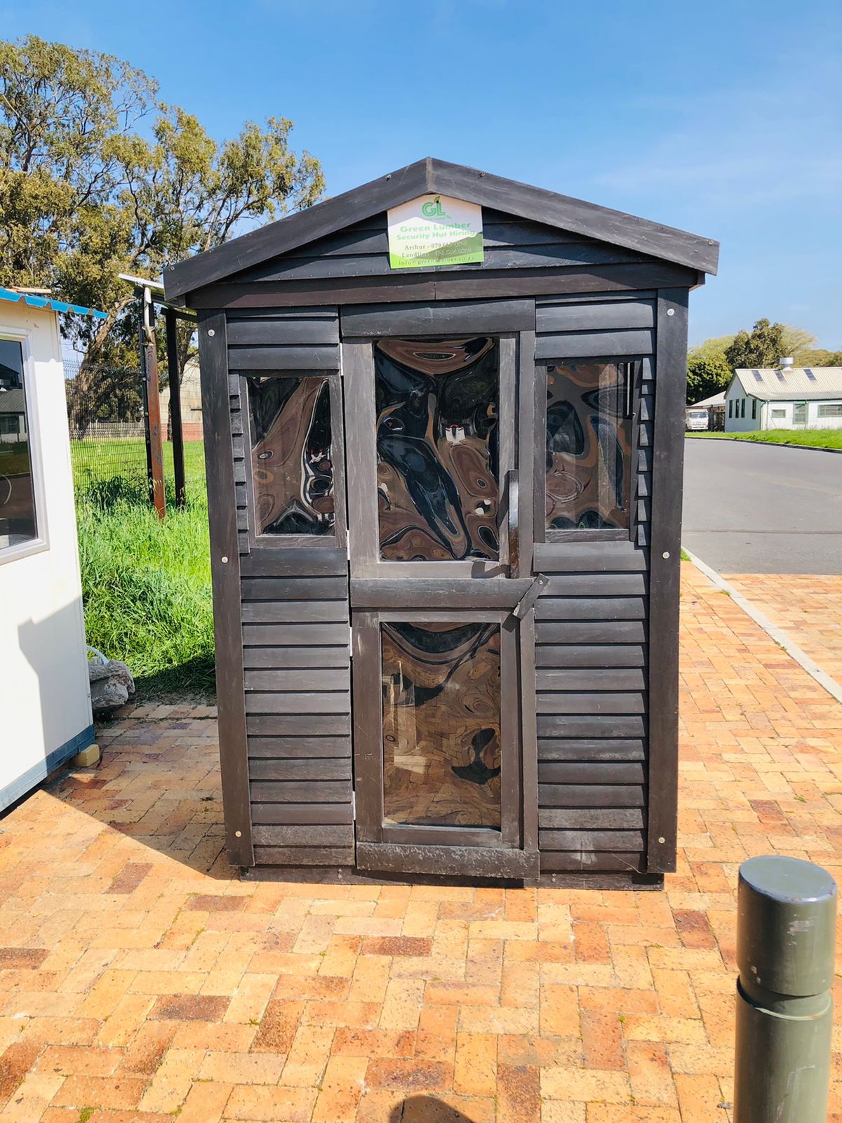 Green Lumber guard hut